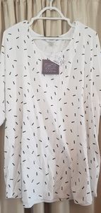 White shirt with gold and black rectangles.